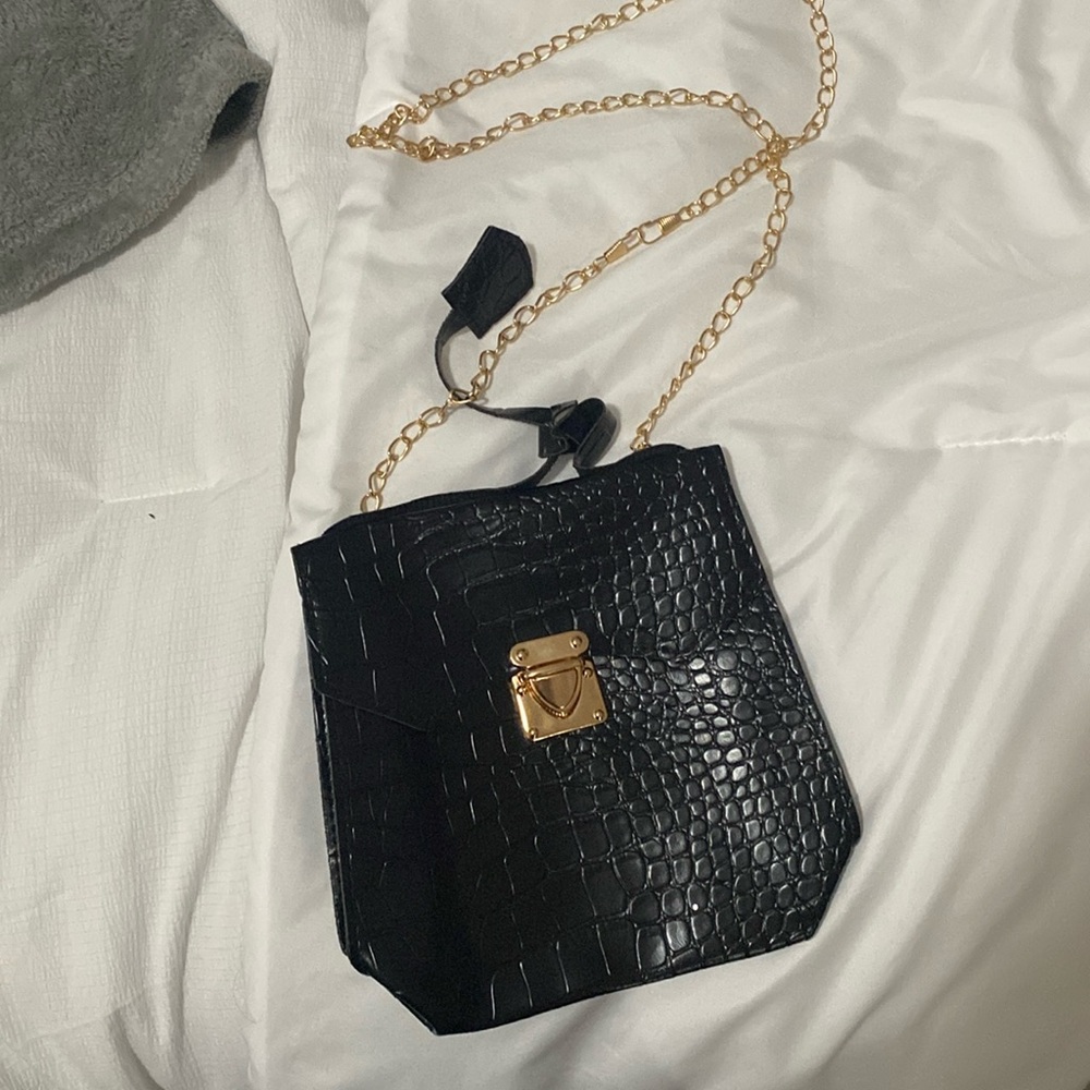 Black and gold purse